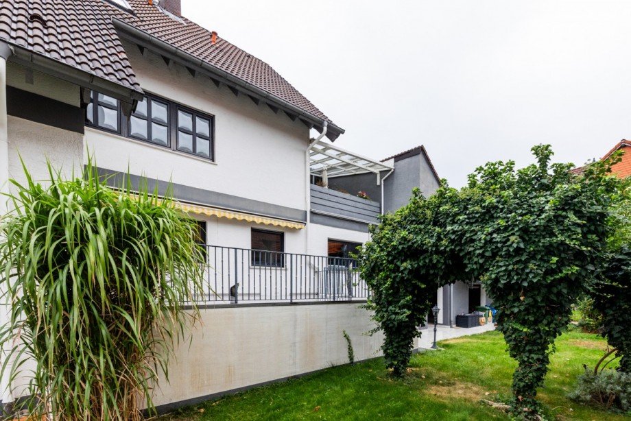 Garten und Terrasse Mehrfamilienhaus Bischofsheim