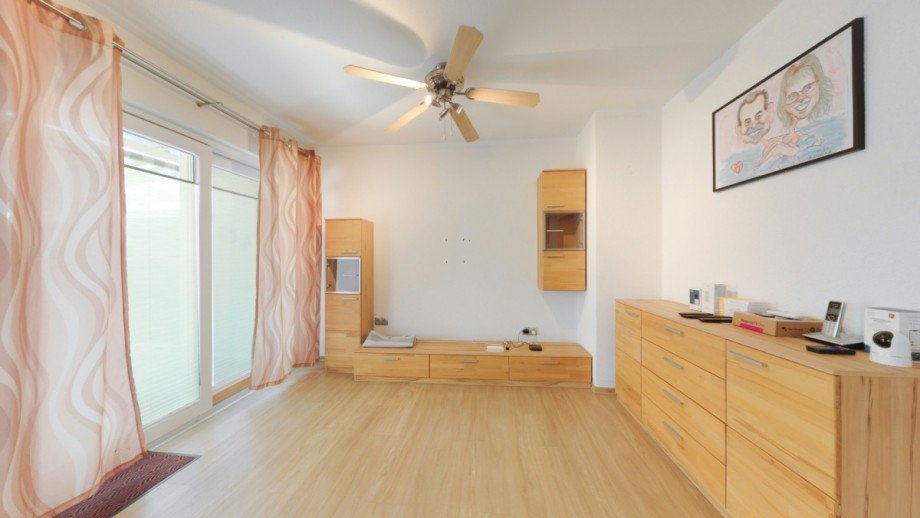 Wohnzimmer_1 Zweifamilienhaus Bischofsheim