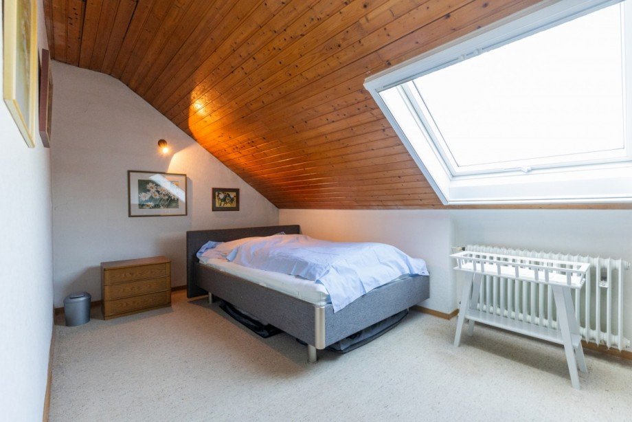Schlafzimmer Dachgeschosswohnung Bischofsheim