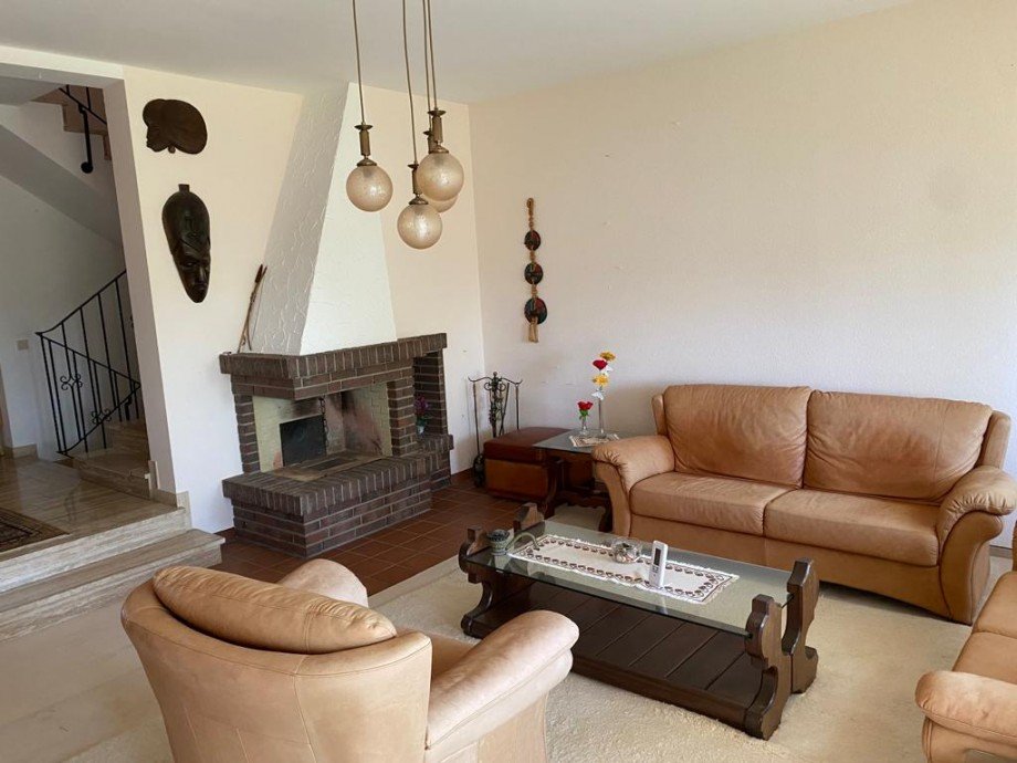 Wohnzimmer mit Kamin Reihenhaus Eppstein / Niederjosbach