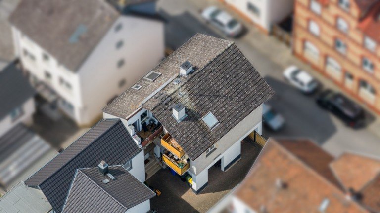 Drohnenbilder Bischofsheim12 Bischofsheim Mehrfamilienhaus Voll vermietetes 3-Familienhaus mit Garage auf WEG-geteiltem Grundst�ck *Verkauf im Bieterverfahren*